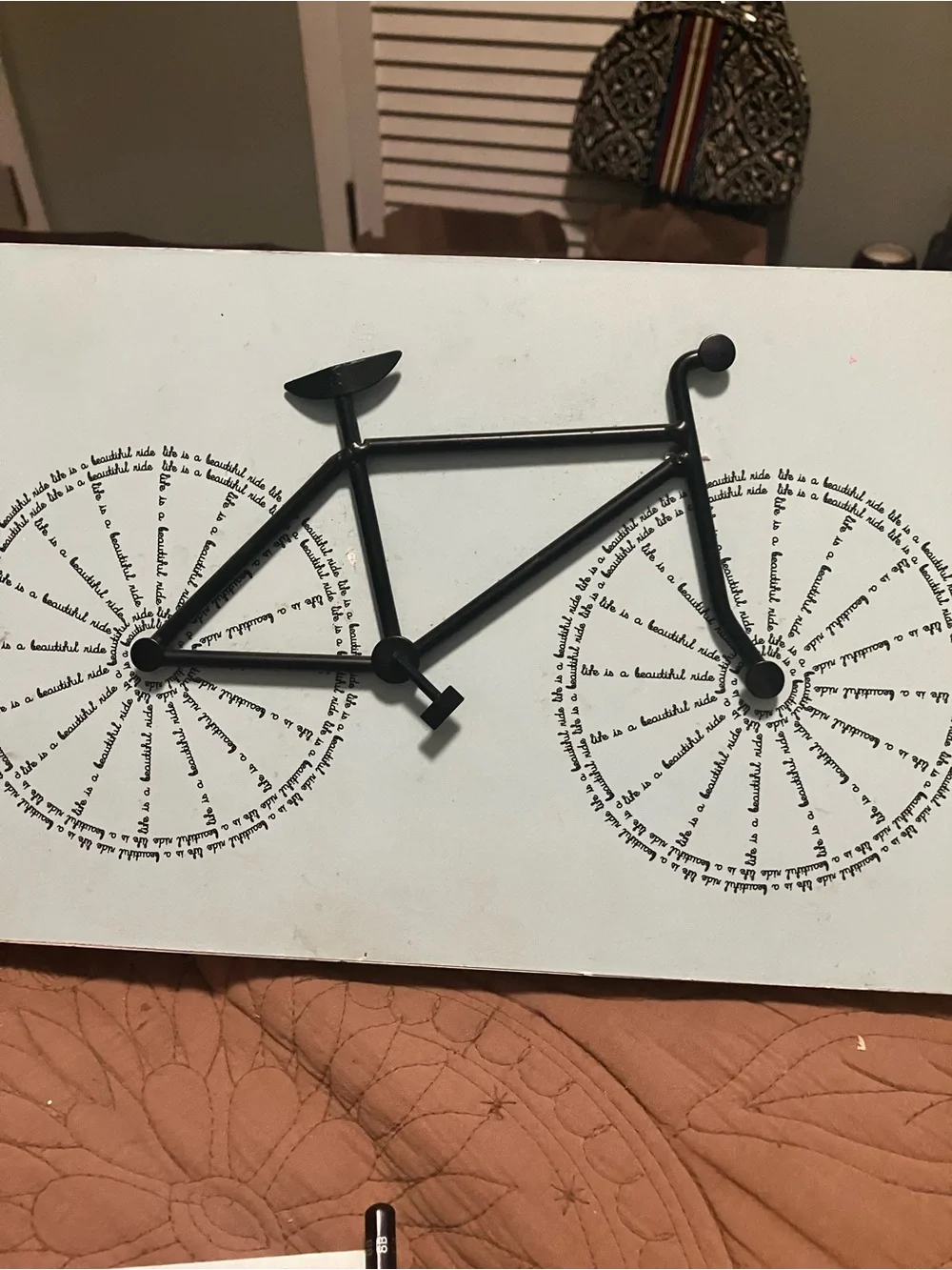 Black Metal Wall Art With a Minimalist Bicycle Silhouette